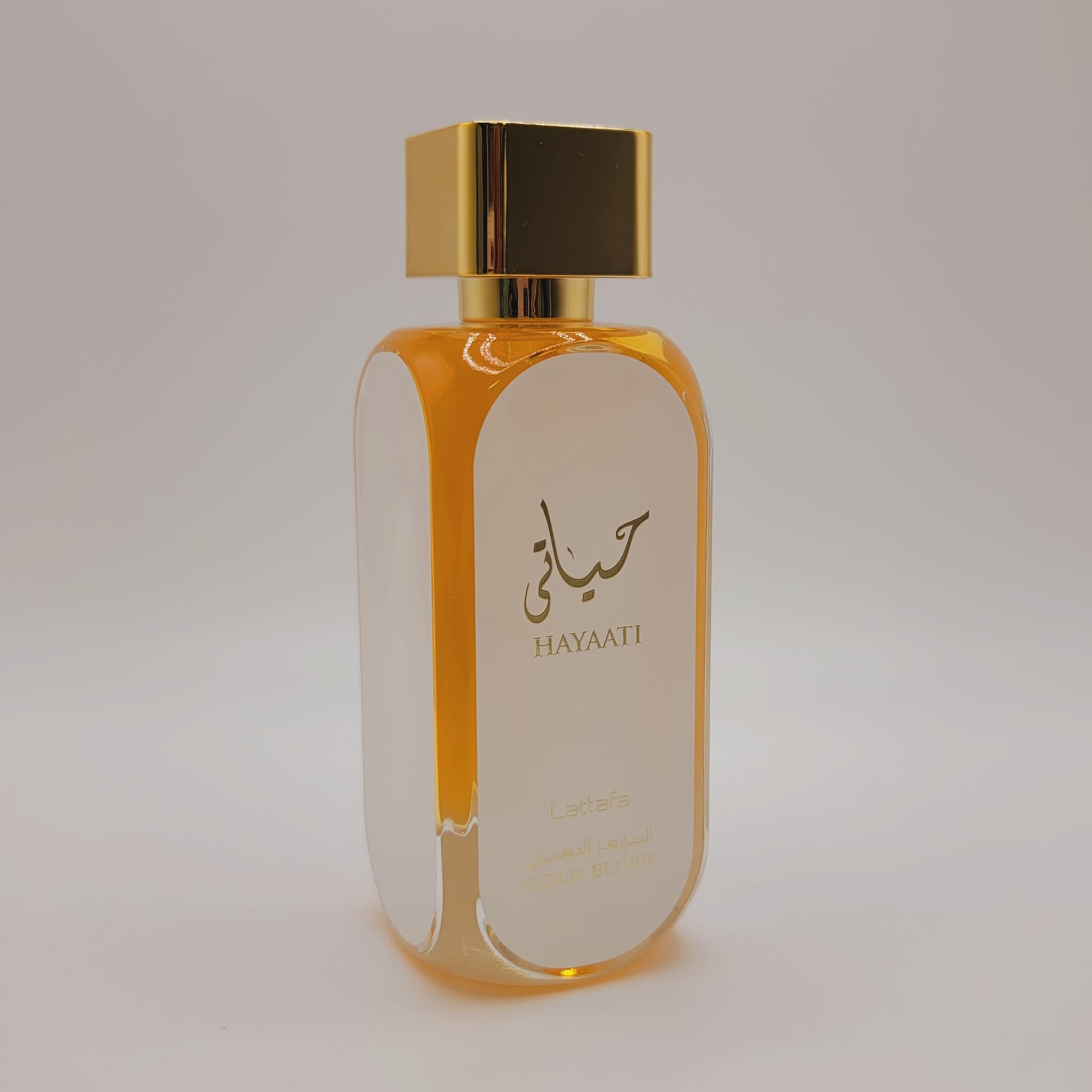 Hayaati Gold Elixir de Lattafa, espray de 100 ml/3.4 fl oz Eau De Parfum Unisex, fragancia floral para una elegancia atemporal.