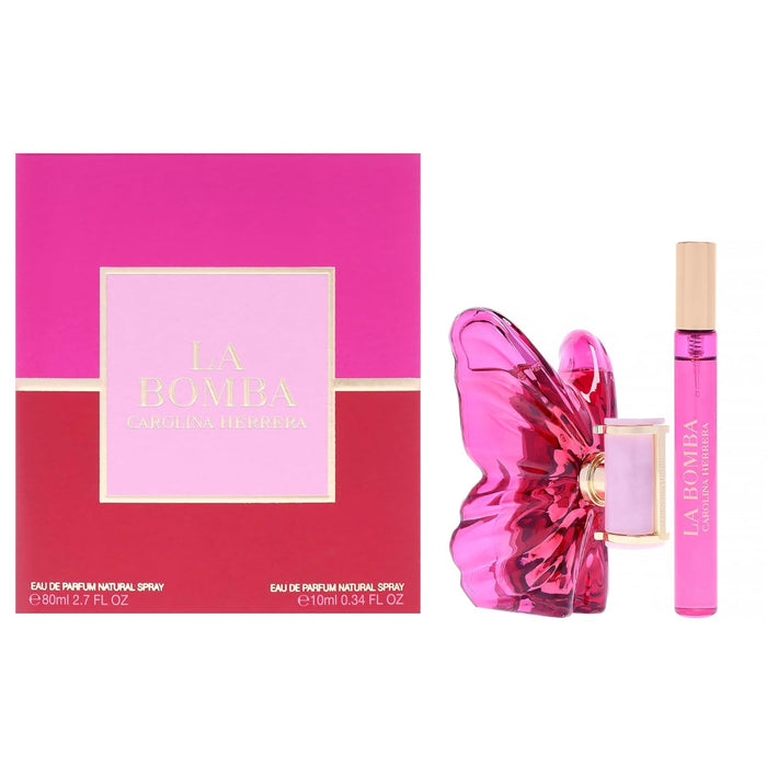 Pink butterfly-shaped perfume bottle and packaging with 'La Bomba' branding on a white background.