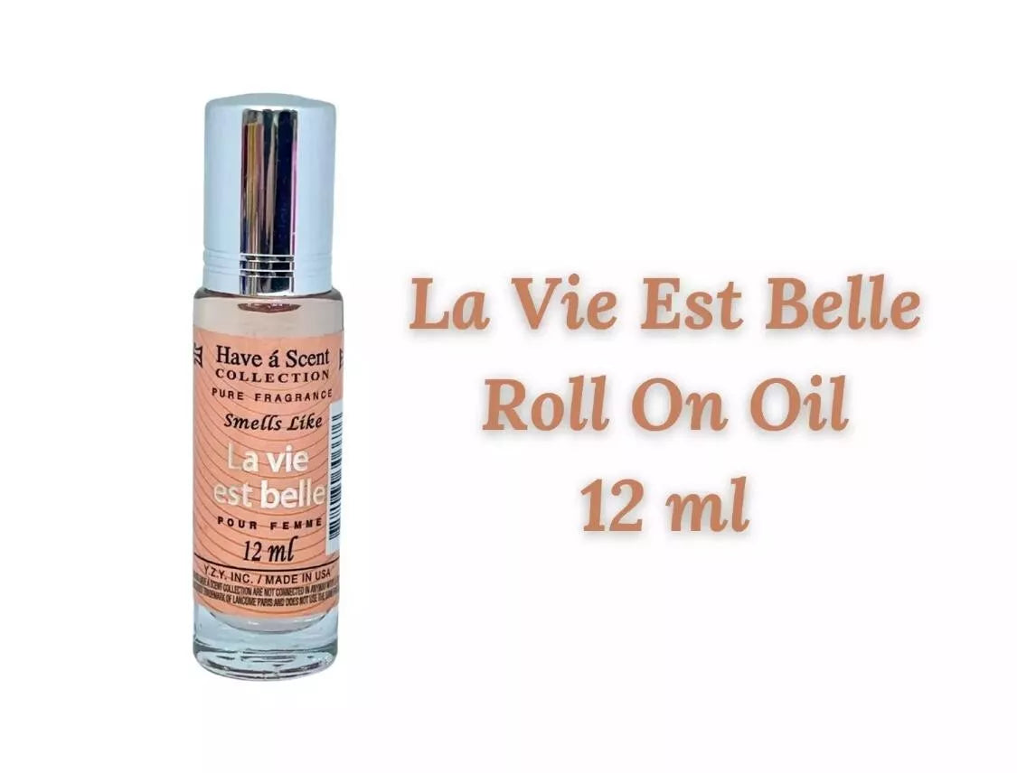 La Vie Est Belle inspired 12ml roll-on body oil. Long-lasting pure fragrance oil with easy roll-on applicator. Perfect for on-the-go application.