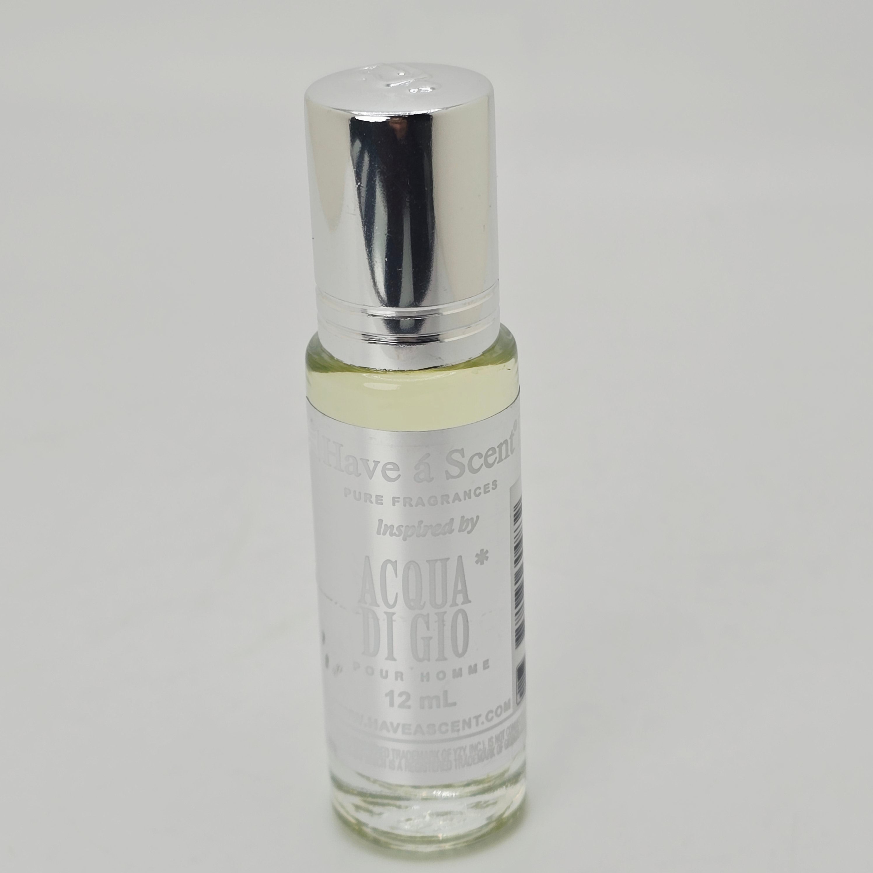 An array of Scent Roll On Body Oil bottles in various colors with labelled fragrances.