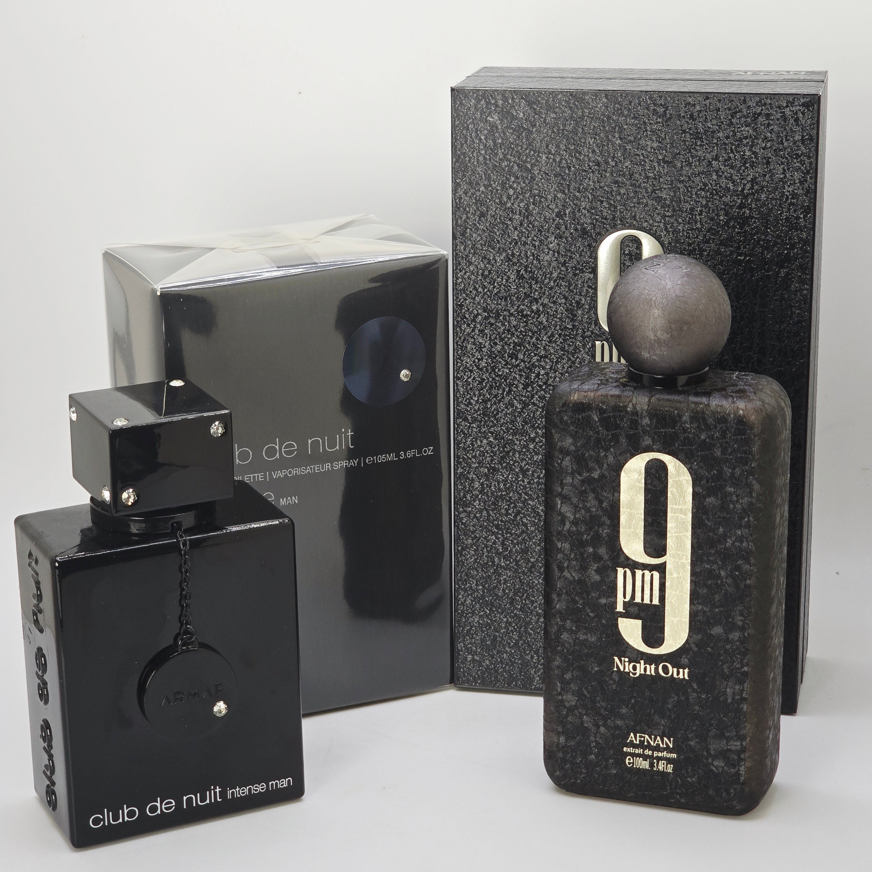 Perfume bottle and packaging with brand logo on a white background