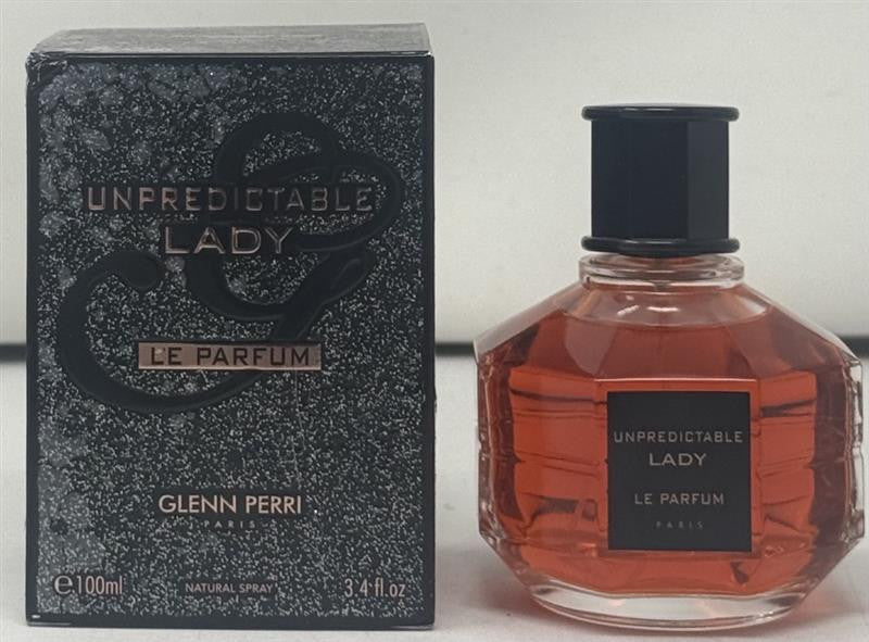 Perfume bottle and packaging of 'Unpredictable Lady' by Glenn Perri on a white background