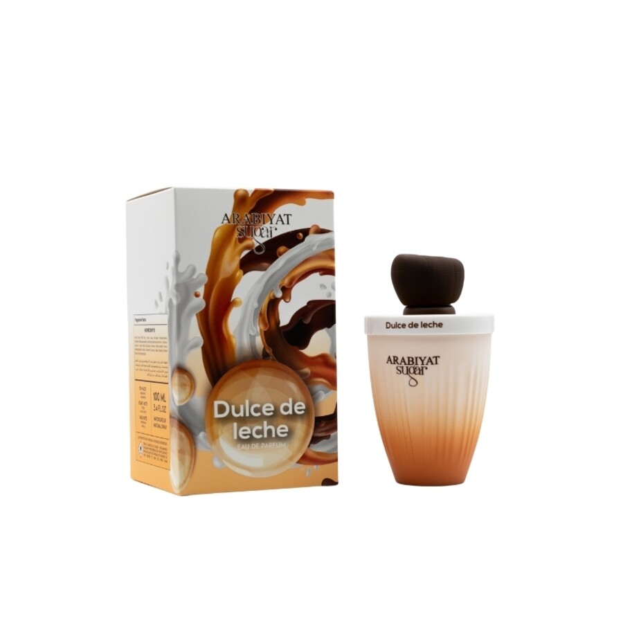 Dulce de leche perfume bottle and packaging on a wooden surface with a beige background