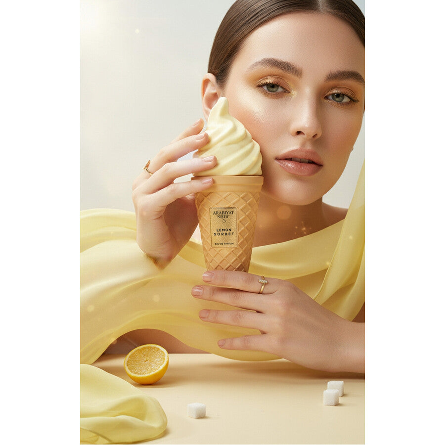 Lemon sorbet-themed perfume packaging and cone on a white background